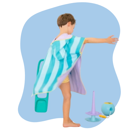 Child wrapped in poncho, water evaporating quickly for rapid drying