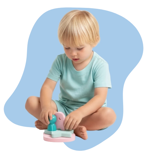 Toddlers manipulating puppets and foam pieces to develop fine motor skills and vocabulary