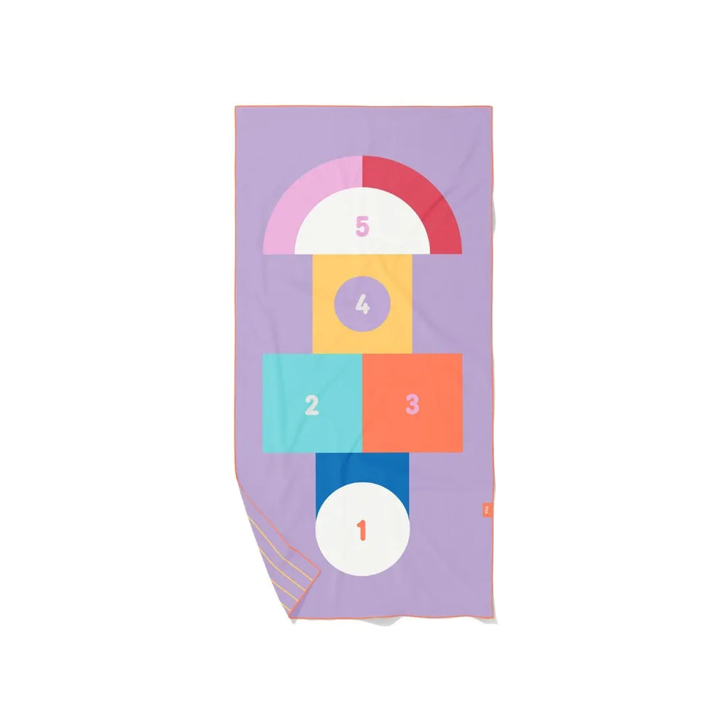 Double-sided hopscotch play towel for kids, designed for beach and pool use