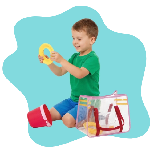 Child holding BPA-free, phthalate-free, and recyclable sand play tools