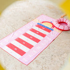 Kids relaxing and playing outdoors with a double-sided play towel