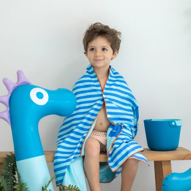 Kids racing, playing, and relaxing with a road-themed double-sided towel