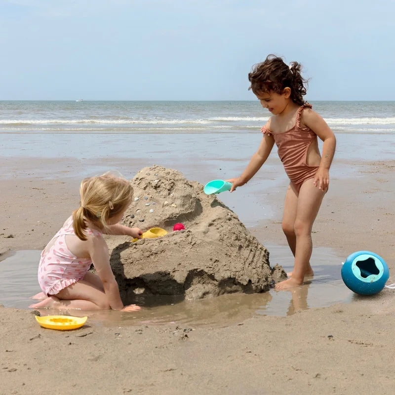Cuppi All-in-One Sand & Water Toy in Action – kids digging, rolling, and creating at beach or pool