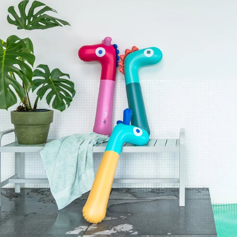 Noodle Dino in Action – kids riding and floating for pool, garden, and beach fun