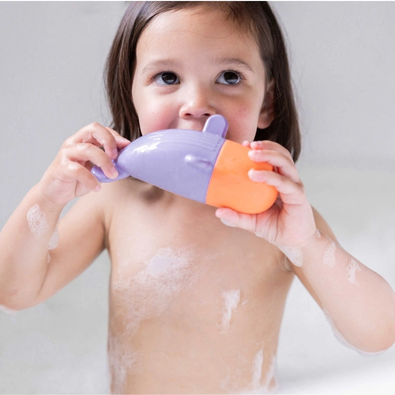Squeezi Whale in Action – toddlers squeeze, float, and play with soft silicone bath toy