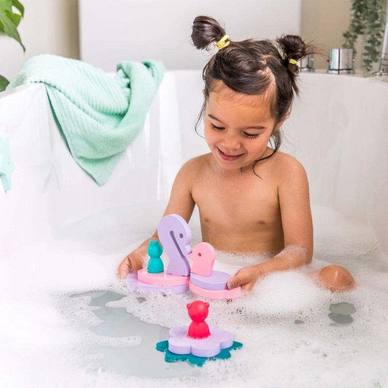 Watch toddlers explore the magical Puzzle Friends Fairy Pond! Floating foam swans, flowers, stars, and finger puppets encourage storytelling, creativity, fine motor skills, and imaginative play for safe and engaging bath adventures.