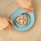 Kid making bubble shapes in the bath with Magic Shapers