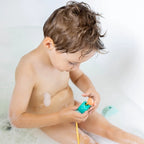 Kids stacking and threading Beedi Croco beads on the bathroom wall