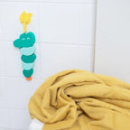 Kids enjoying creative water play with Beedi Croco bath beads