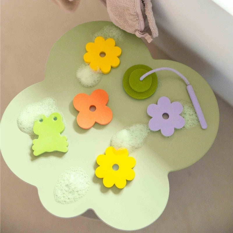 Child practicing hand-eye coordination with bath fishing game
