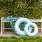 Green Swimring inflated for pool use