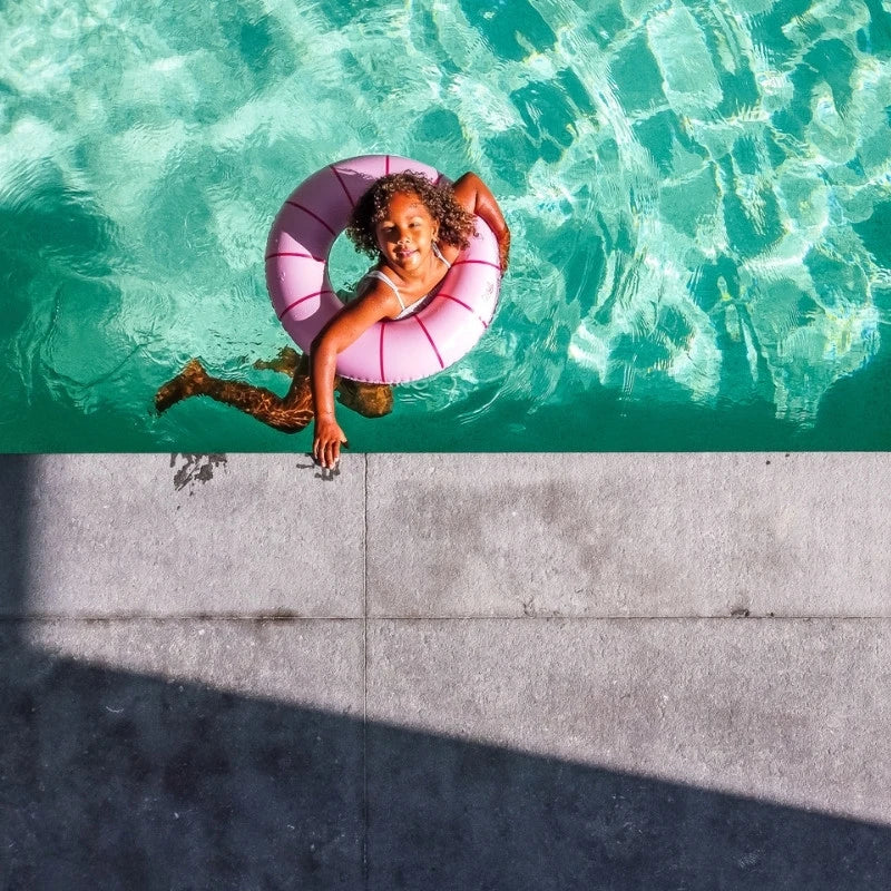 Children playing together with multiple Swimrings