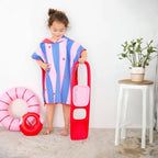 Kids Playing along in ponchos, keeping dry and cozy