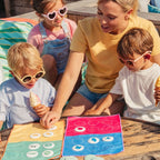 Family enjoying quiet focus play with Bingo/Lotocolor on holiday