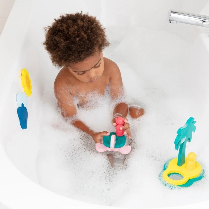 Kids stacking and moving foam shapes while developing fine motor skills