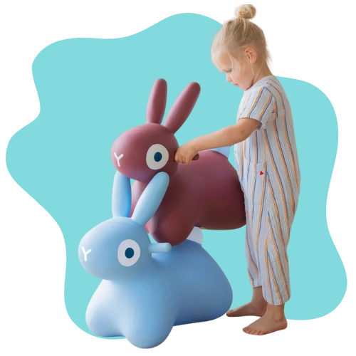 Child riding a sturdy inflatable bunny toy made for safe indoor and outdoor play