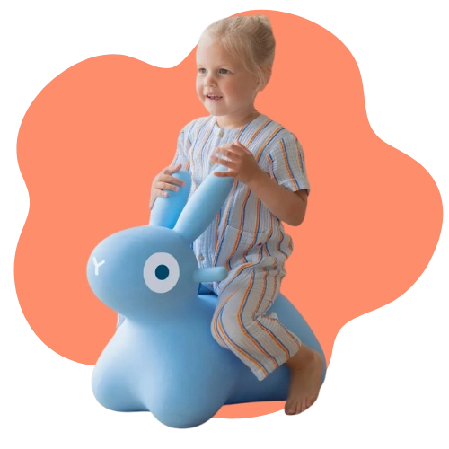 Kids role-playing and imagining adventures with a bunny ride-on toy